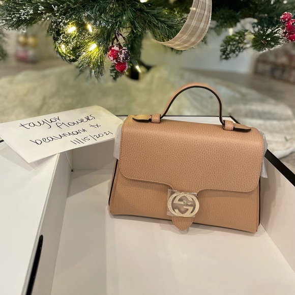 Gucci Handbags - Gucci medium interlocking dollar bag. BRAND NEW.